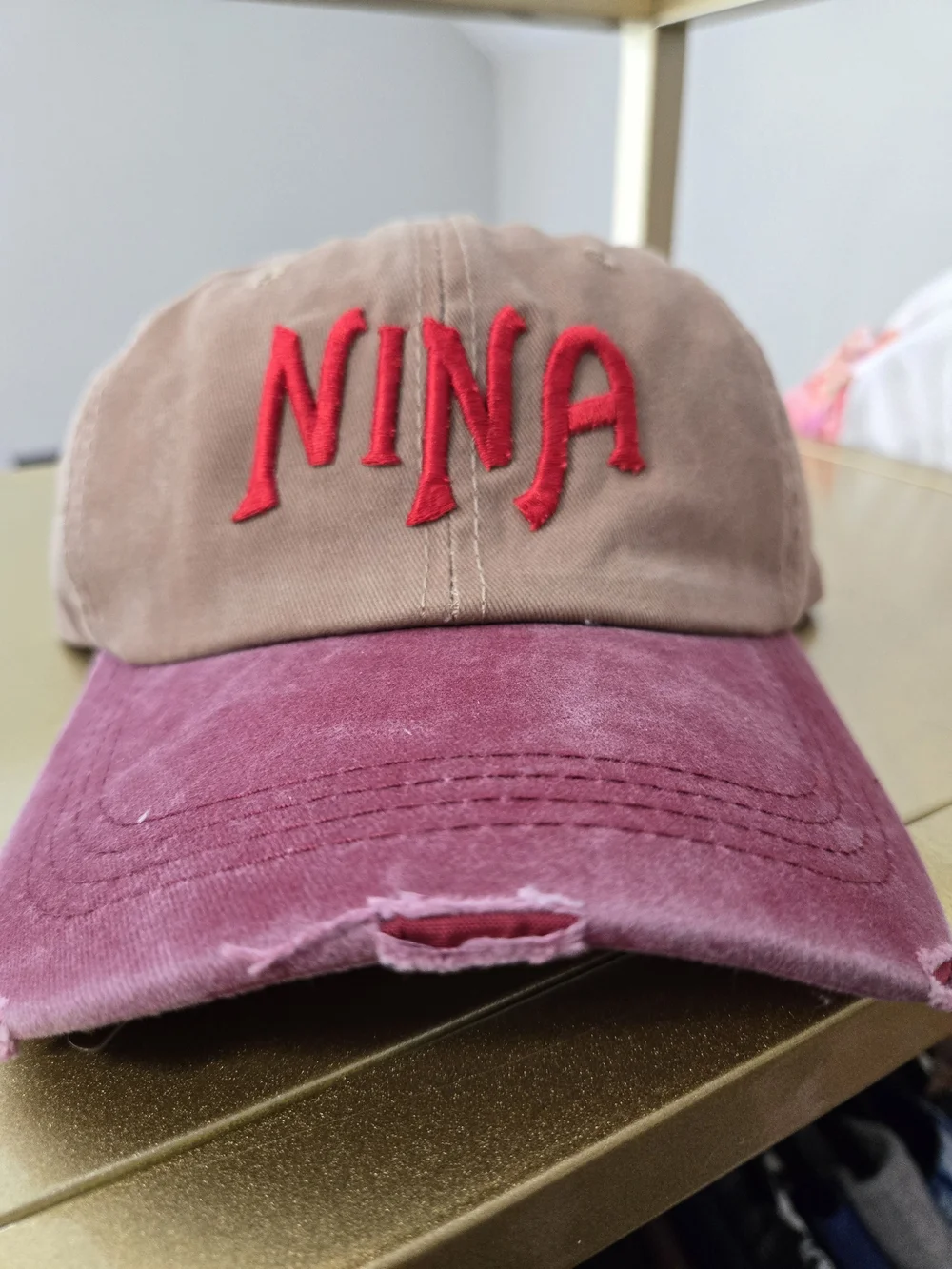NINA Embroidery Maroon and Tan Womens Distressed Trucker Cap
